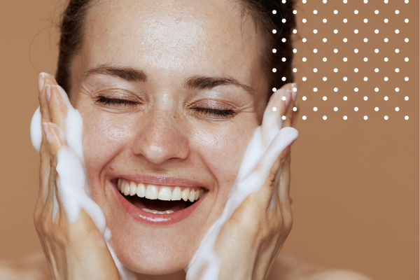 Lady washing face 