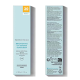 Front and back views of a SkinCeuticals Brightening UV Defense Sunscreen cream 30ml box, showing the light blue packaging with orange and dark blue text.