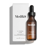 Medik8 C-Tetra Luxe serum bottle with dropper and packaging on a white background