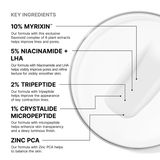 Product packaging with key ingredients labeled on a white background